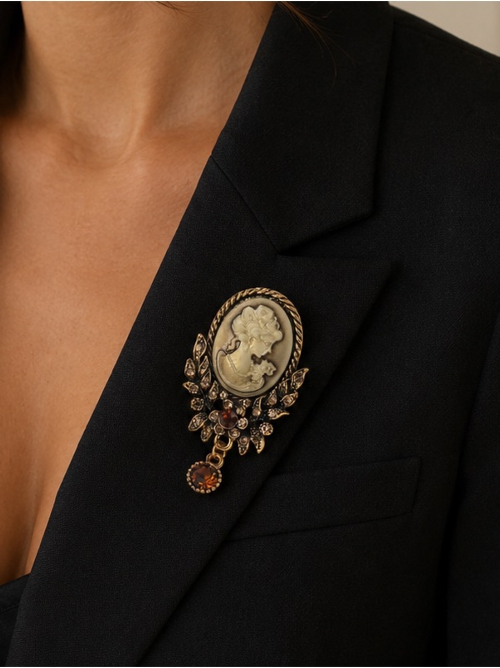 Vintage-Inspired Gold Cameo Brooch with Amber Accents